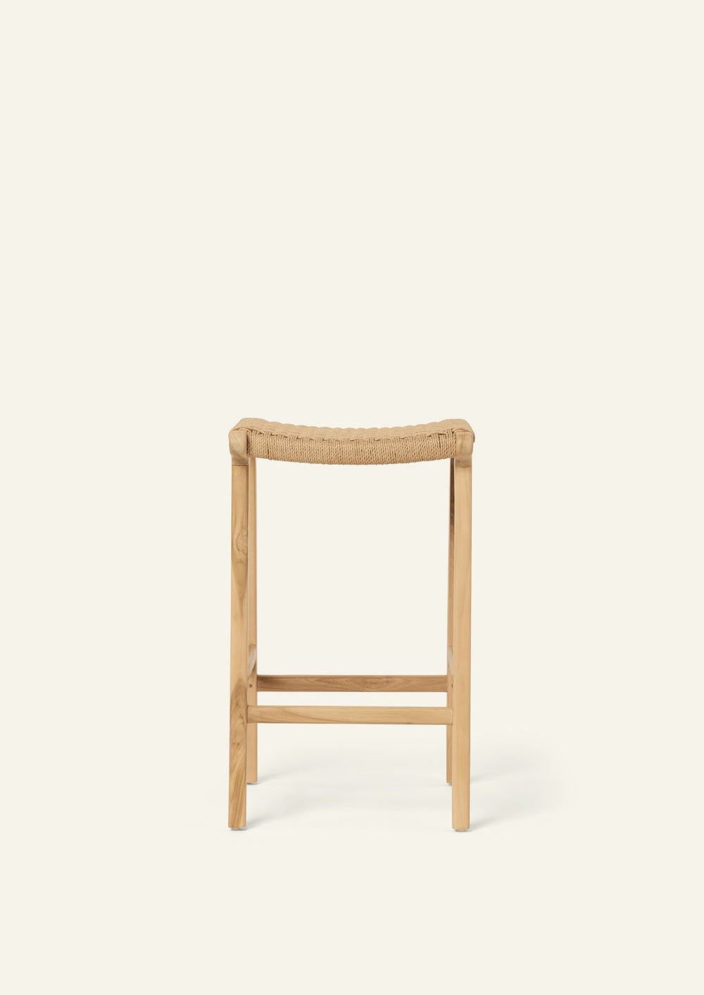 Front view of the Bali Counter Stool featuring a woven natural paper cord seat and solid teak frame. The open weave introduces texture while maintaining an airy, minimalist aesthetic.