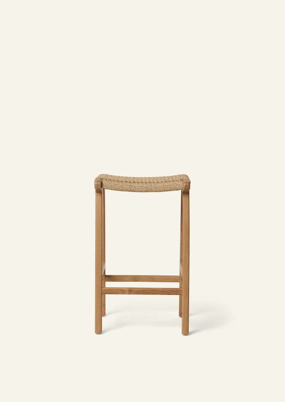 Front view of the Bali Counter Stool showcasing its minimalist teak frame, subtle joinery details, and woven synthetic paper cord seat designed for durability and everyday use.