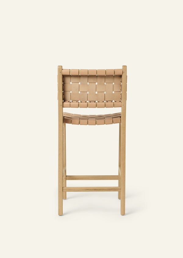 Back view of the Bali Counter Stool in solid white oak with handwoven full-grain natural leather.