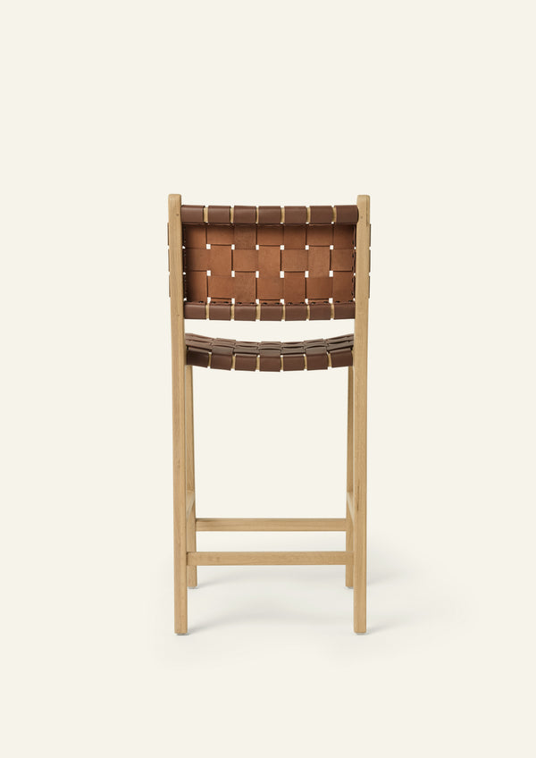 Back view of the Bali Counter Stool in solid white oak with handwoven whiskey leather.