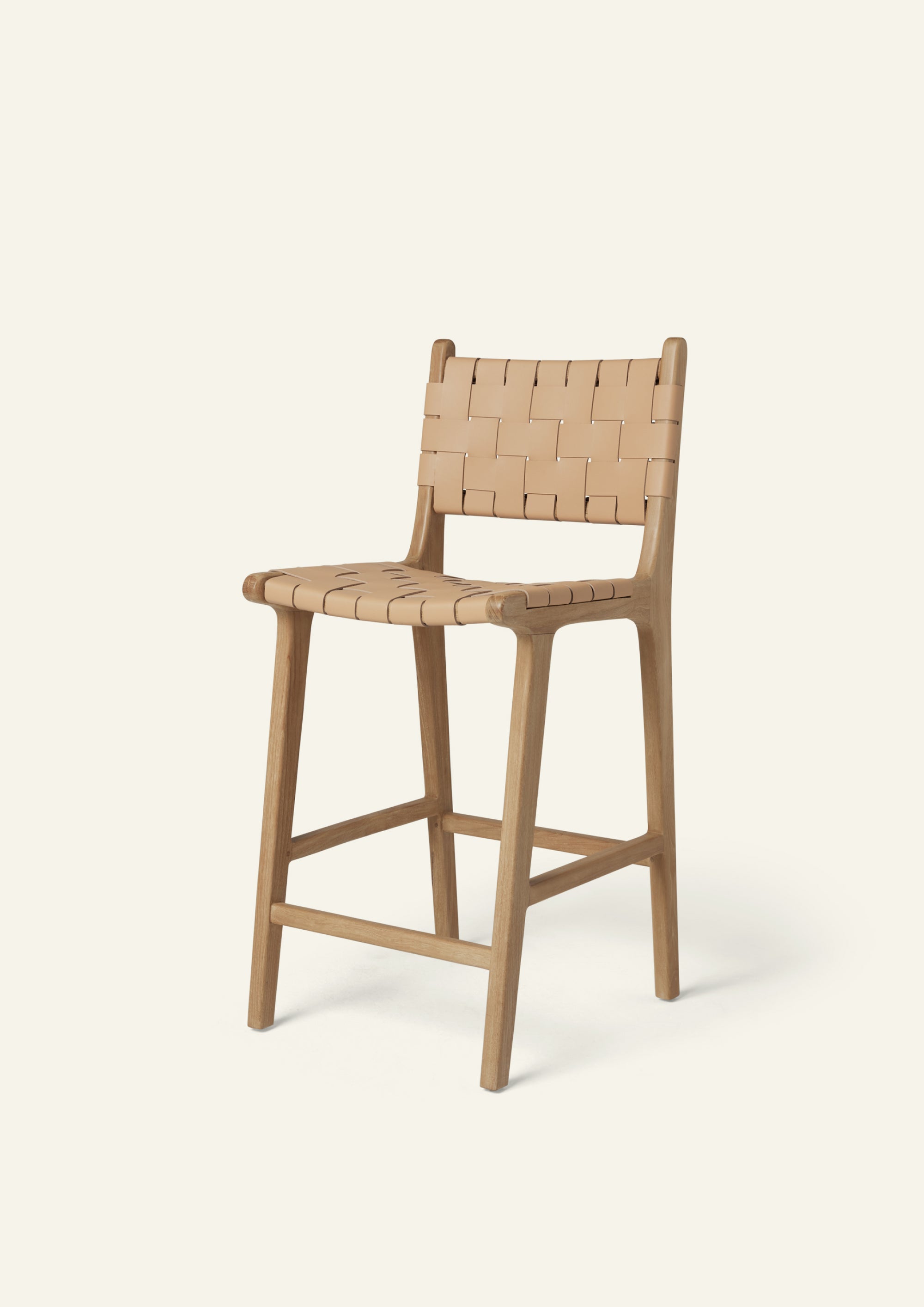 Bali Counter Stool in solid white oak with handwoven full-grain natural leather, shown in a three-quarter view.