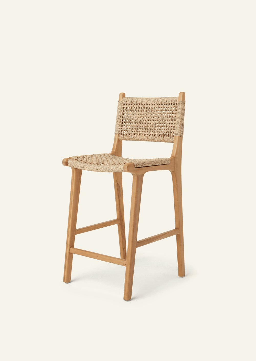 Angled view of the Bali Counter Stool in outdoor synthetic paper cord with solid teak construction