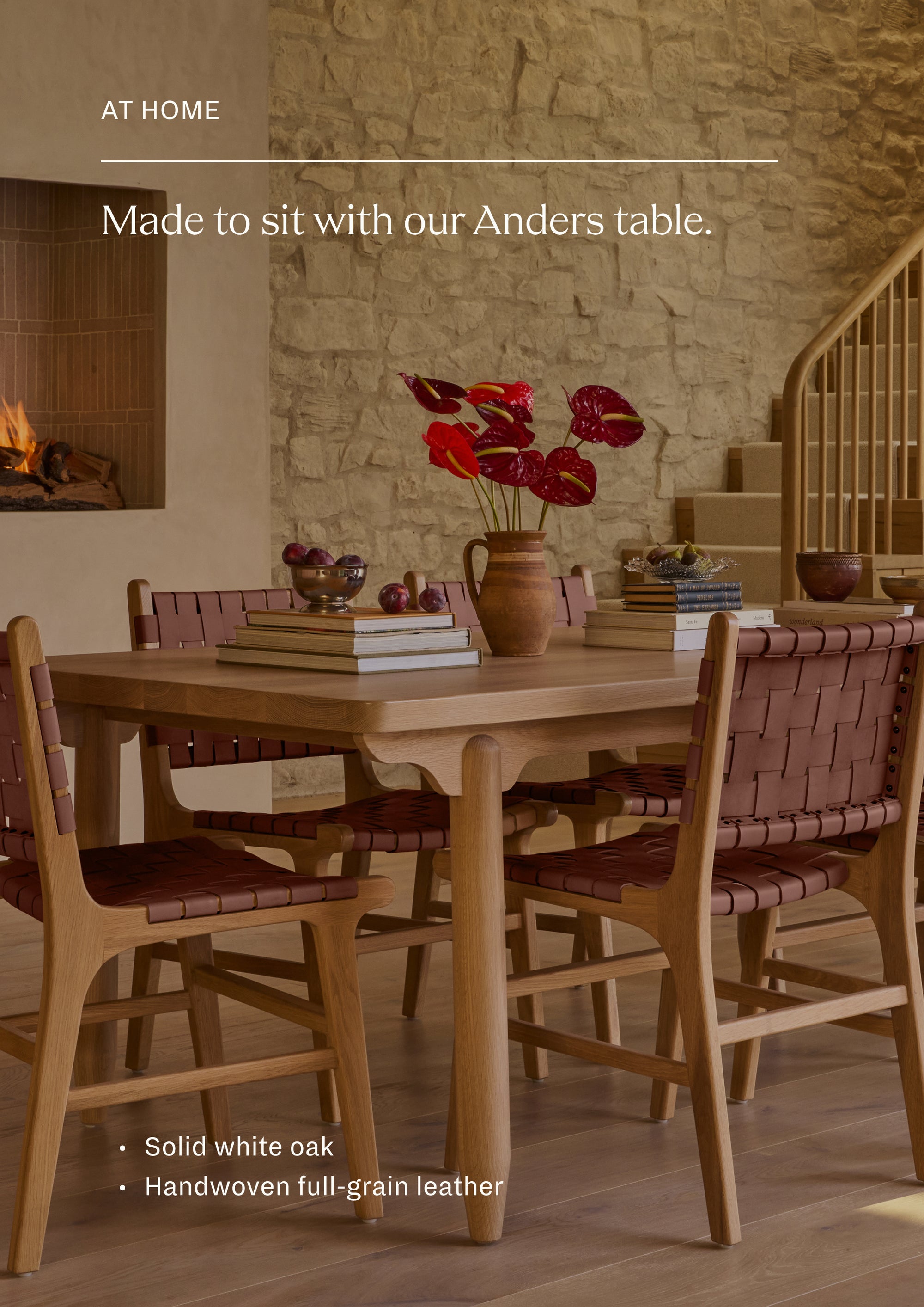 The Bali Dining Chair styled around the Anders Dining Table in a warm, layered dining room. The woven whiskey leather adds texture, warmth, and a collected feel to the space.