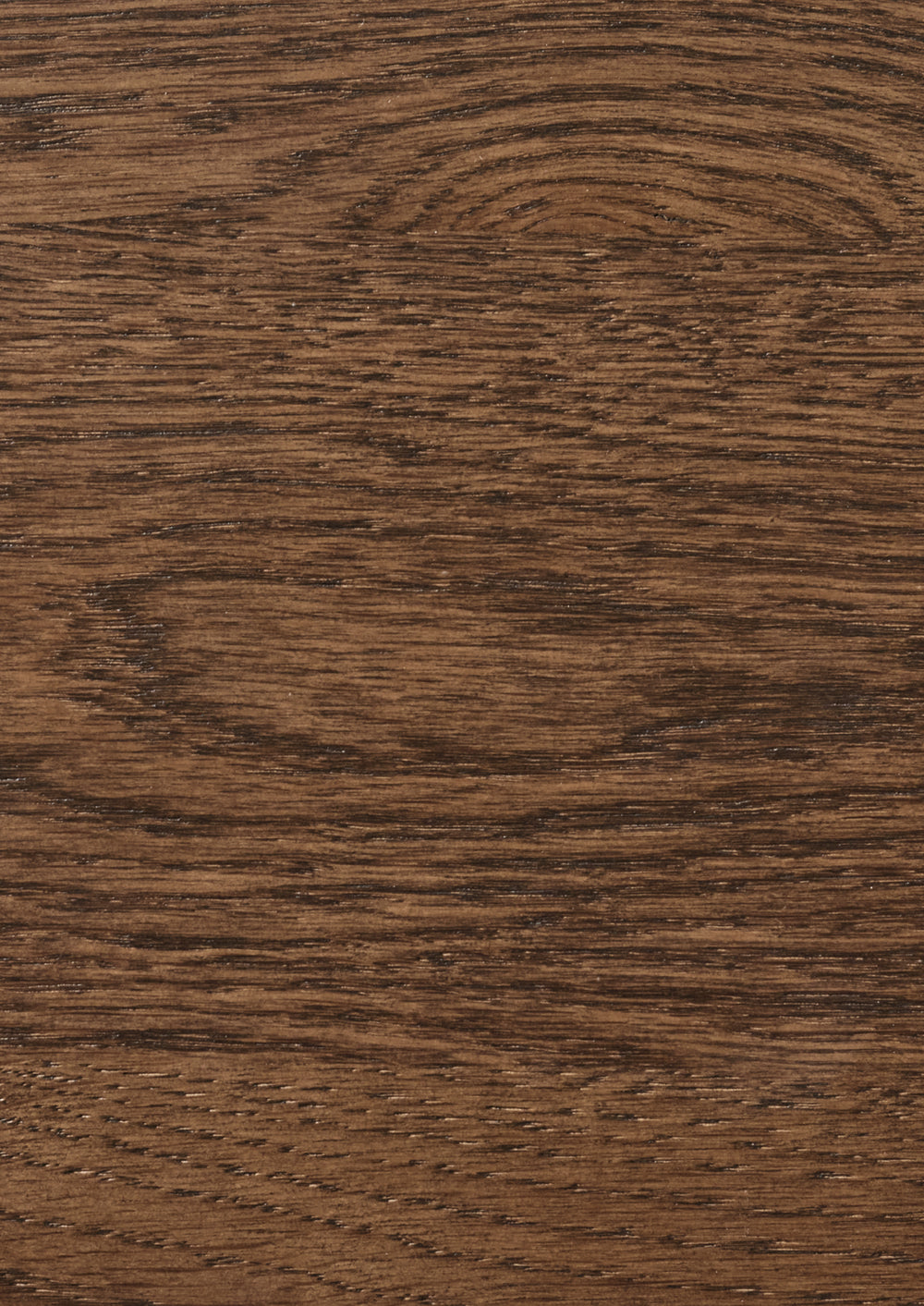 Close-up of a brown oak surface with visible grain and texture