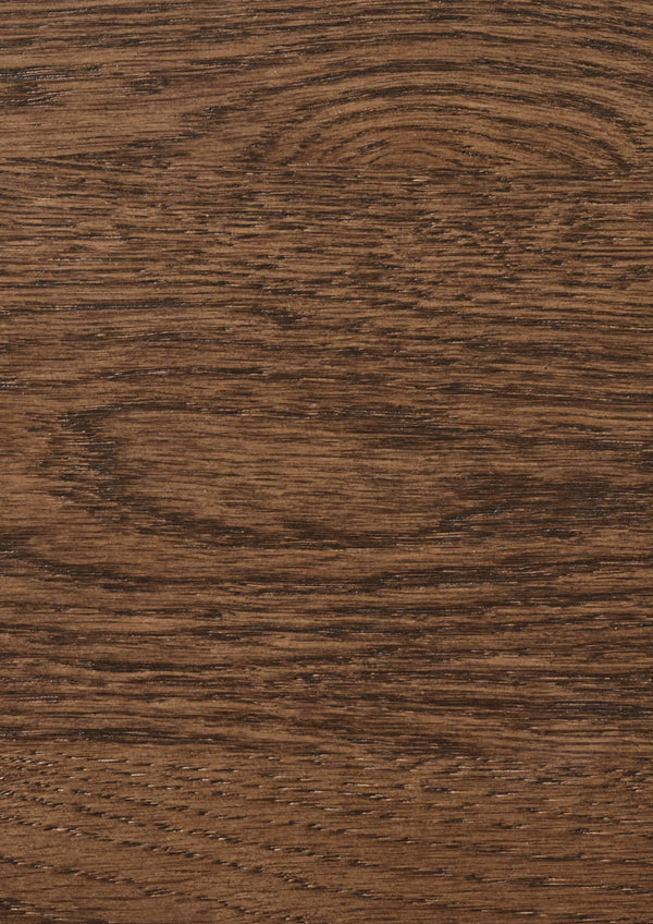 Close-up of a brown oak surface with visible grain and texture