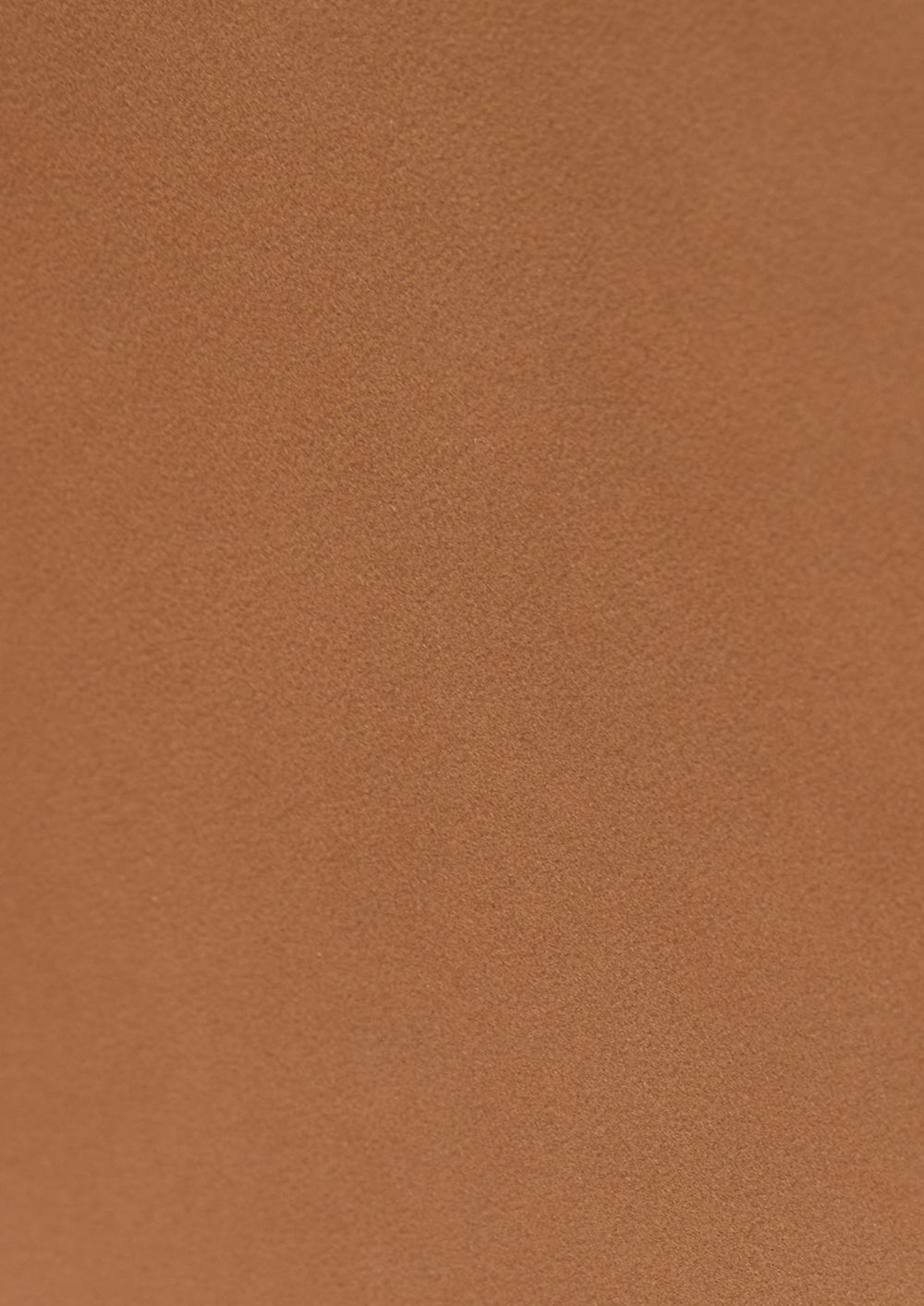 Solid warm brown leather swatch
