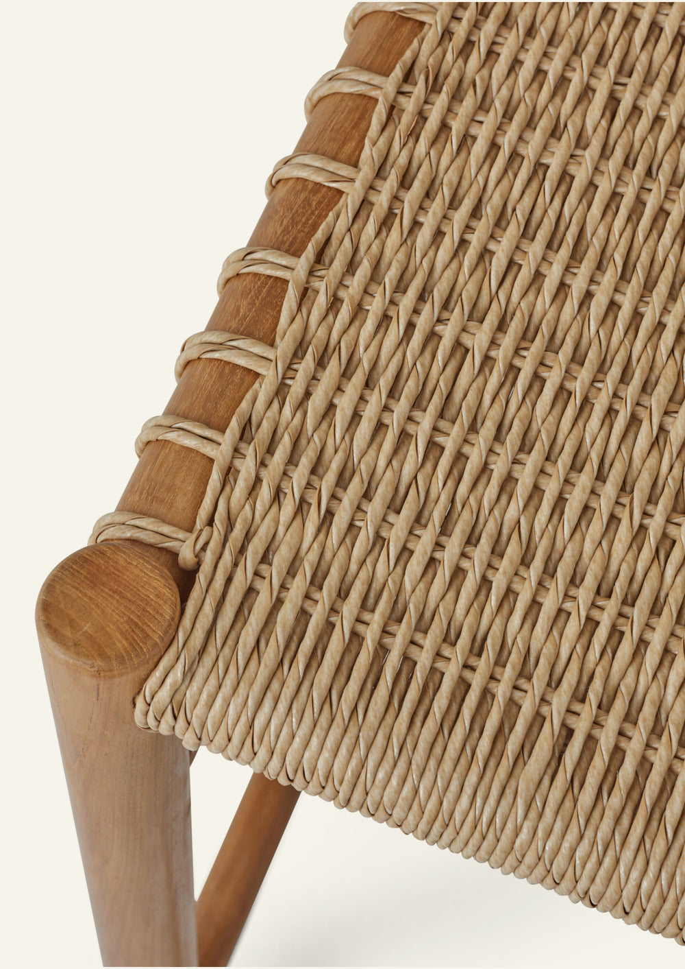 Close-up of the woven synthetic paper cord backrest, revealing the intricate basket-weave pattern and craftsmanship. The UV-treated material offers the appearance of natural fiber with enhanced durability.
