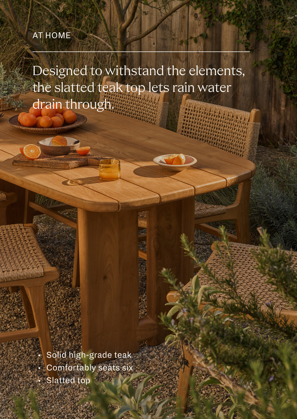 Outdoor dining setting featuring the teak dining table paired with coordinating woven dining chairs. Styled with fresh produce and tableware, the space creates an inviting atmosphere for open-air meals and entertaining.