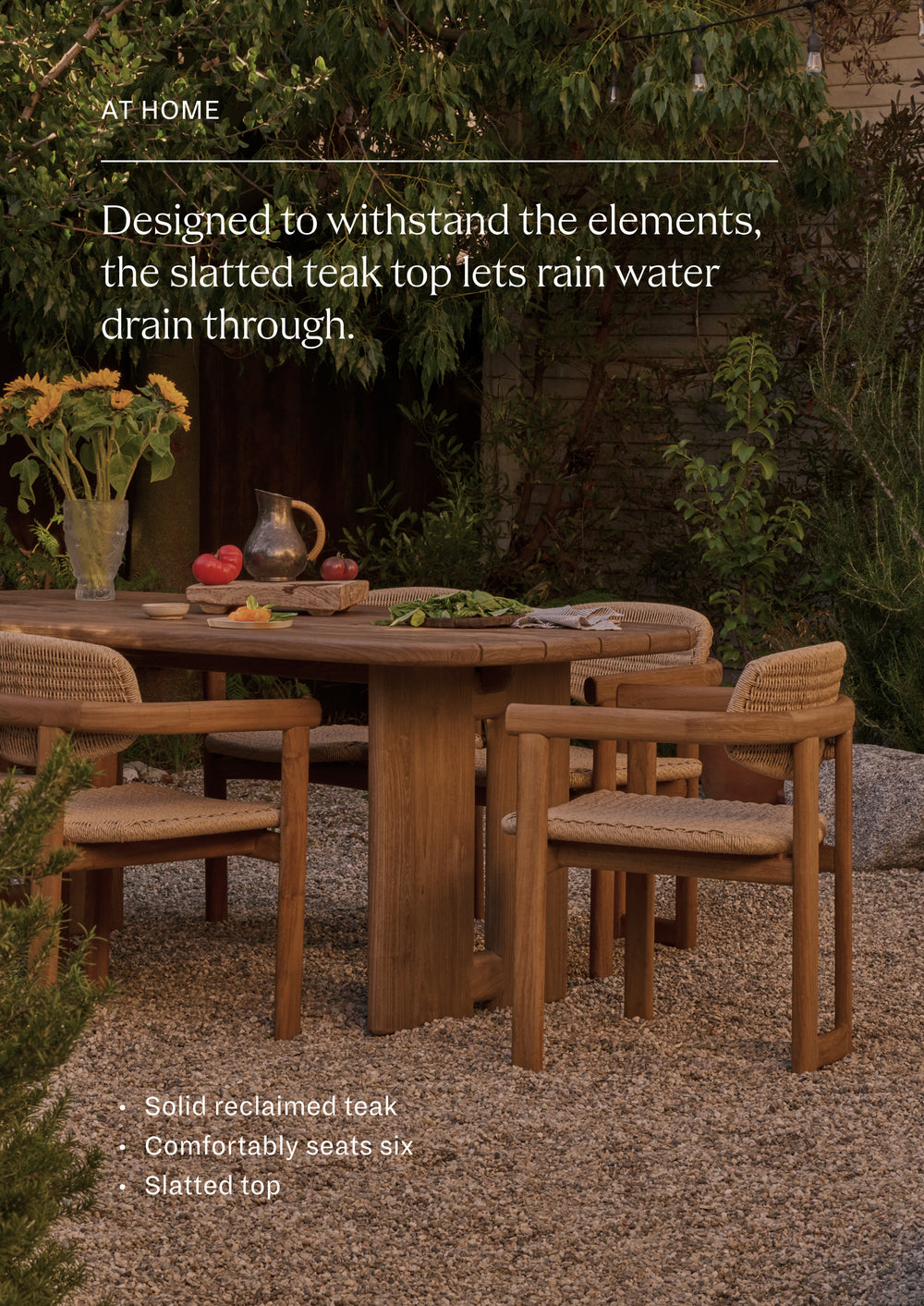 Outdoor dining setting featuring the reclaimed teak dining table paired with coordinating woven teak dining chairs. Styled in a garden landscape, the table creates a welcoming space for gathering, dining, and entertaining outdoors.