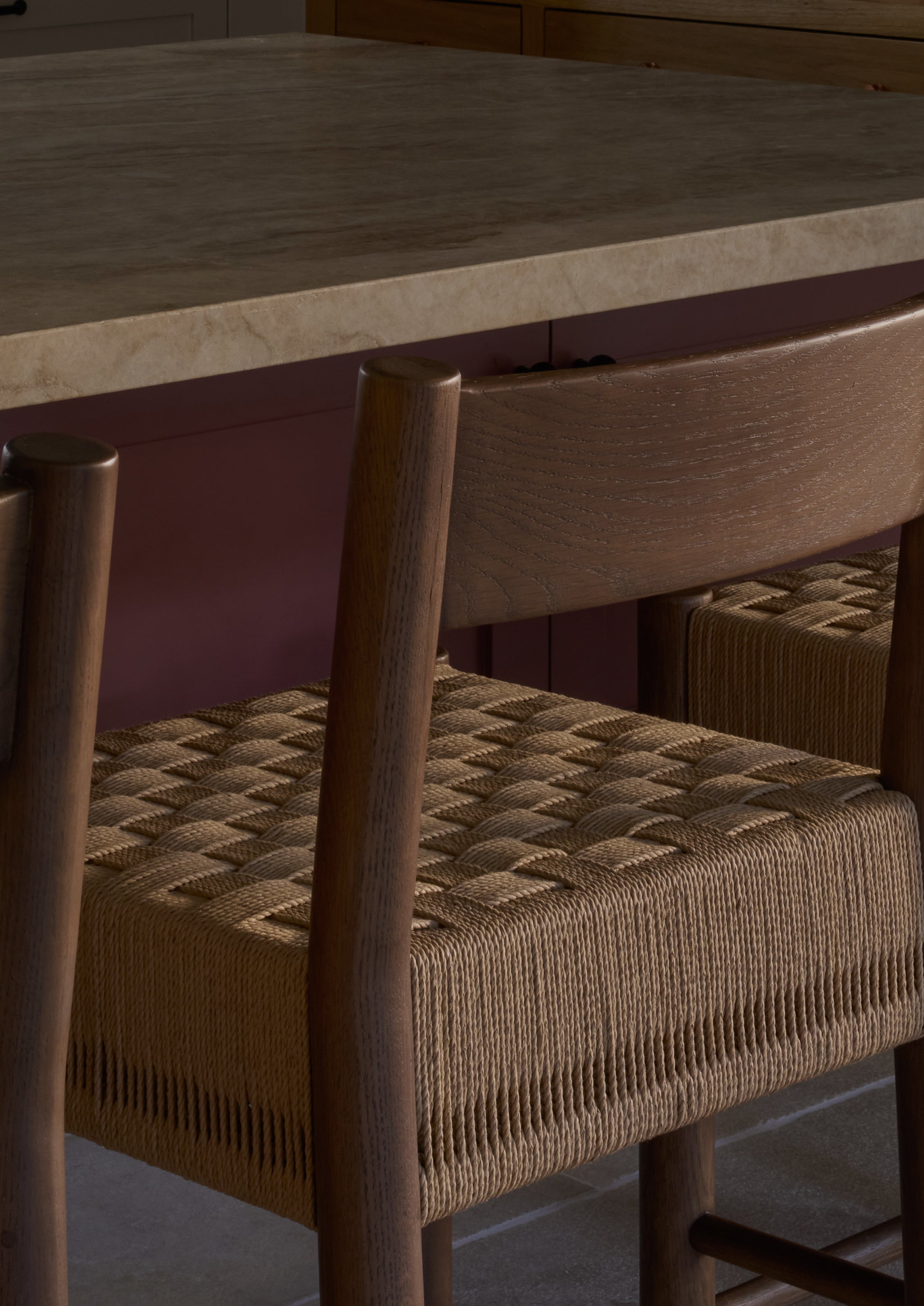 Isa Counter Stool - brown oak with a woven checkerboard paper cord