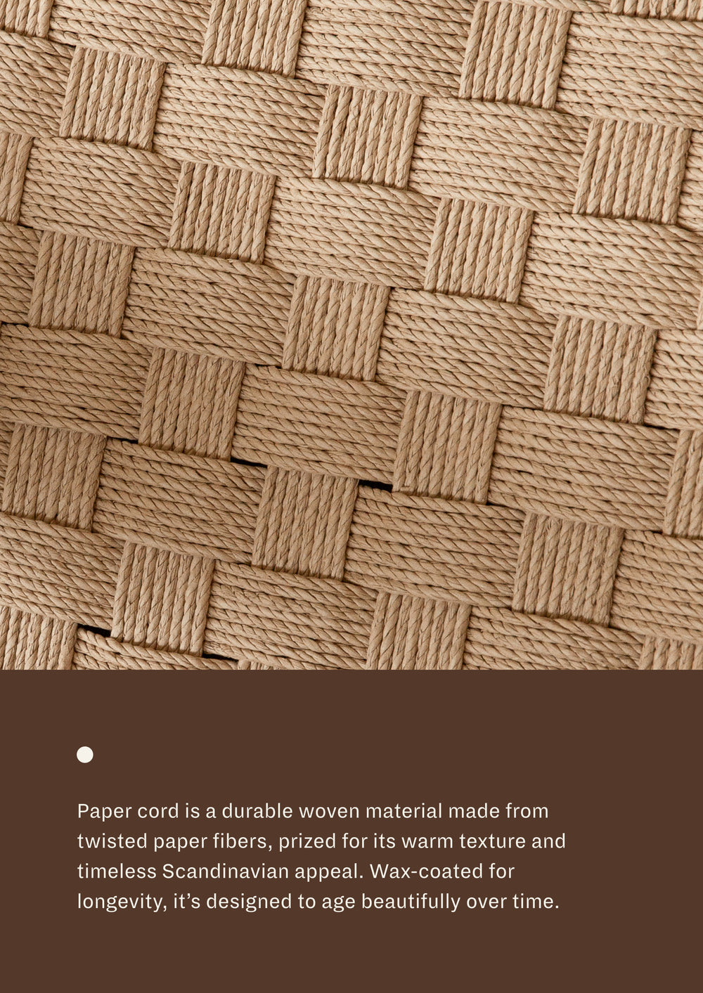 Close-up detail of the woven paper cord used on the chair’s seat and backrest, showcasing the basketweave pattern and textured surface of the durable woven fibers. Wax-coated for longevity, it's designed to age beautifully over time.