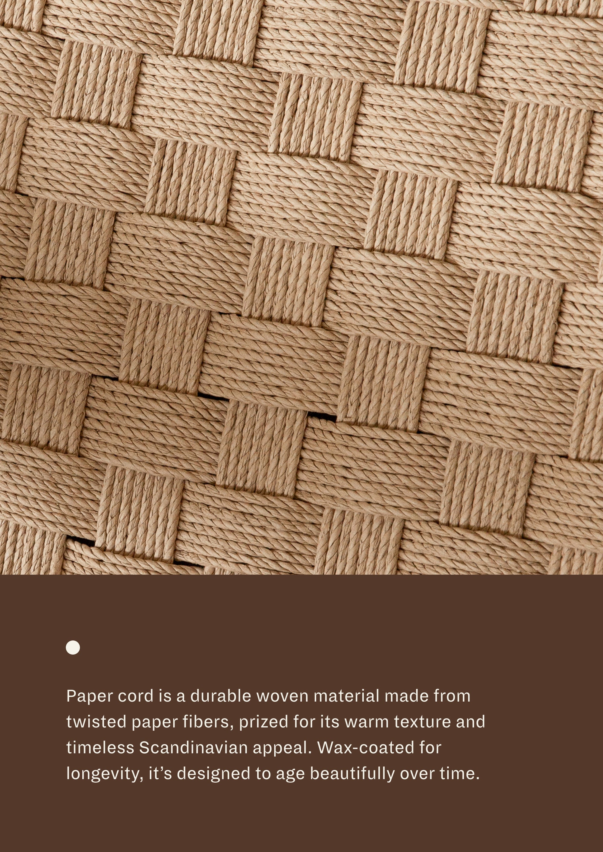 Close-up detail of the woven paper cord used on the chair’s seat and backrest, showcasing the basketweave pattern and textured surface of the durable woven fibers. Wax-coated for longevity, it's designed to age beautifully over time.