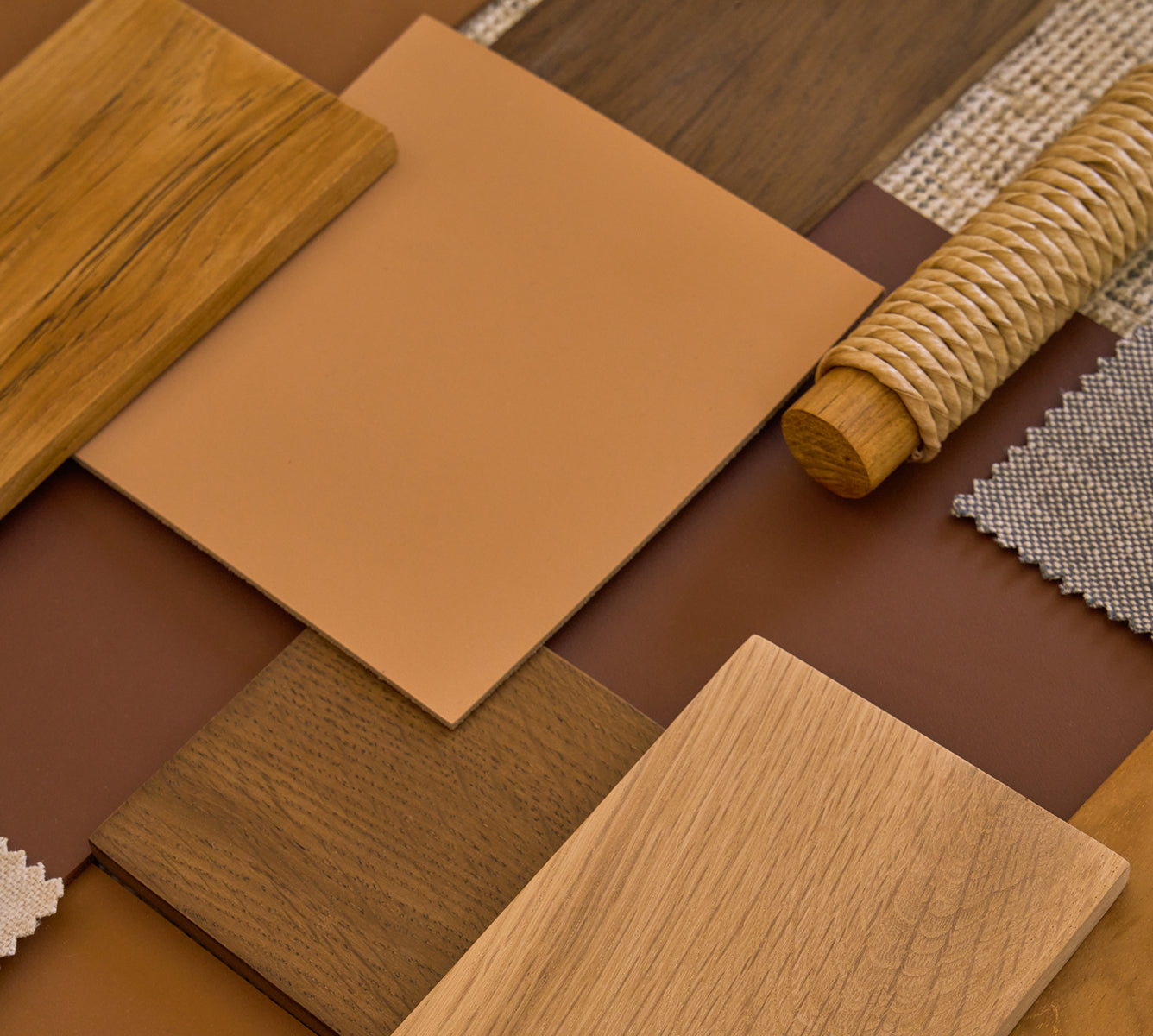 Various wood, leather, fabric, and woven samples offered in Hati home products. 