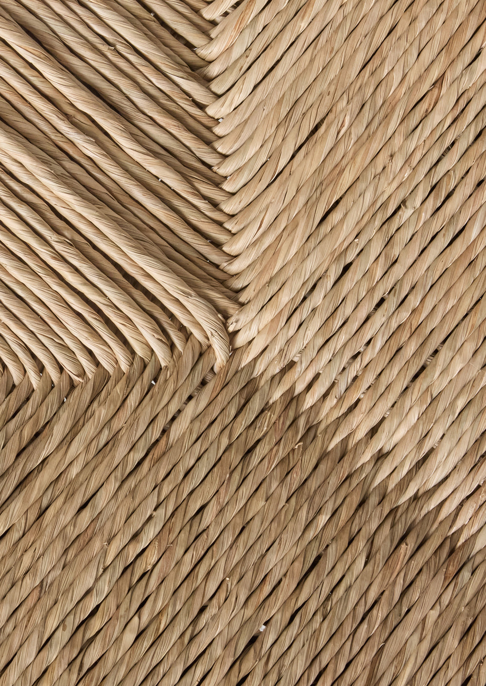 Close-up of a woven natural rush sample 