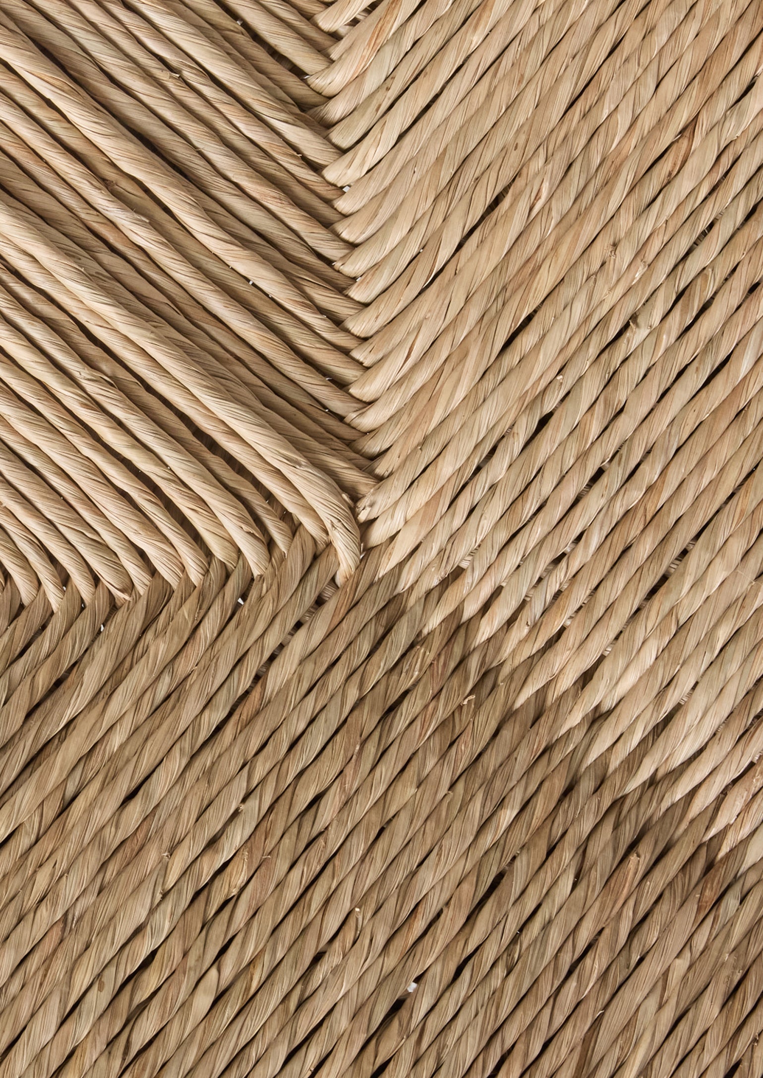 Close-up of a woven natural rush sample 