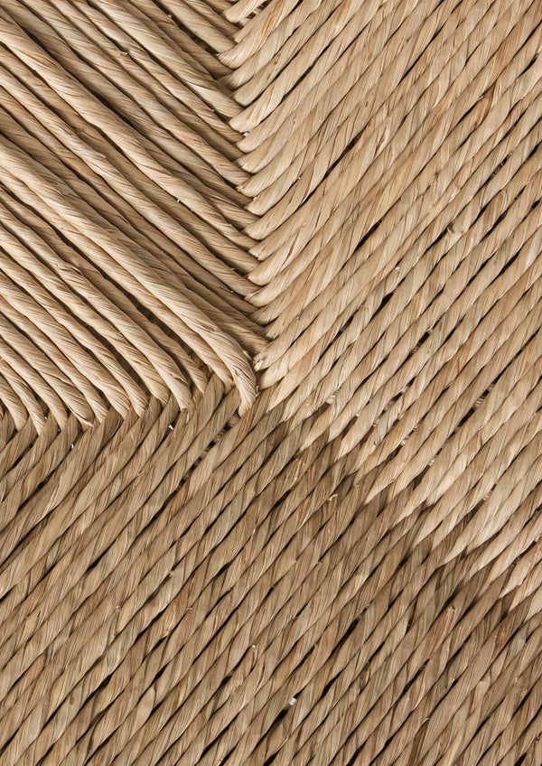 Close-up of a woven natural rush sample 