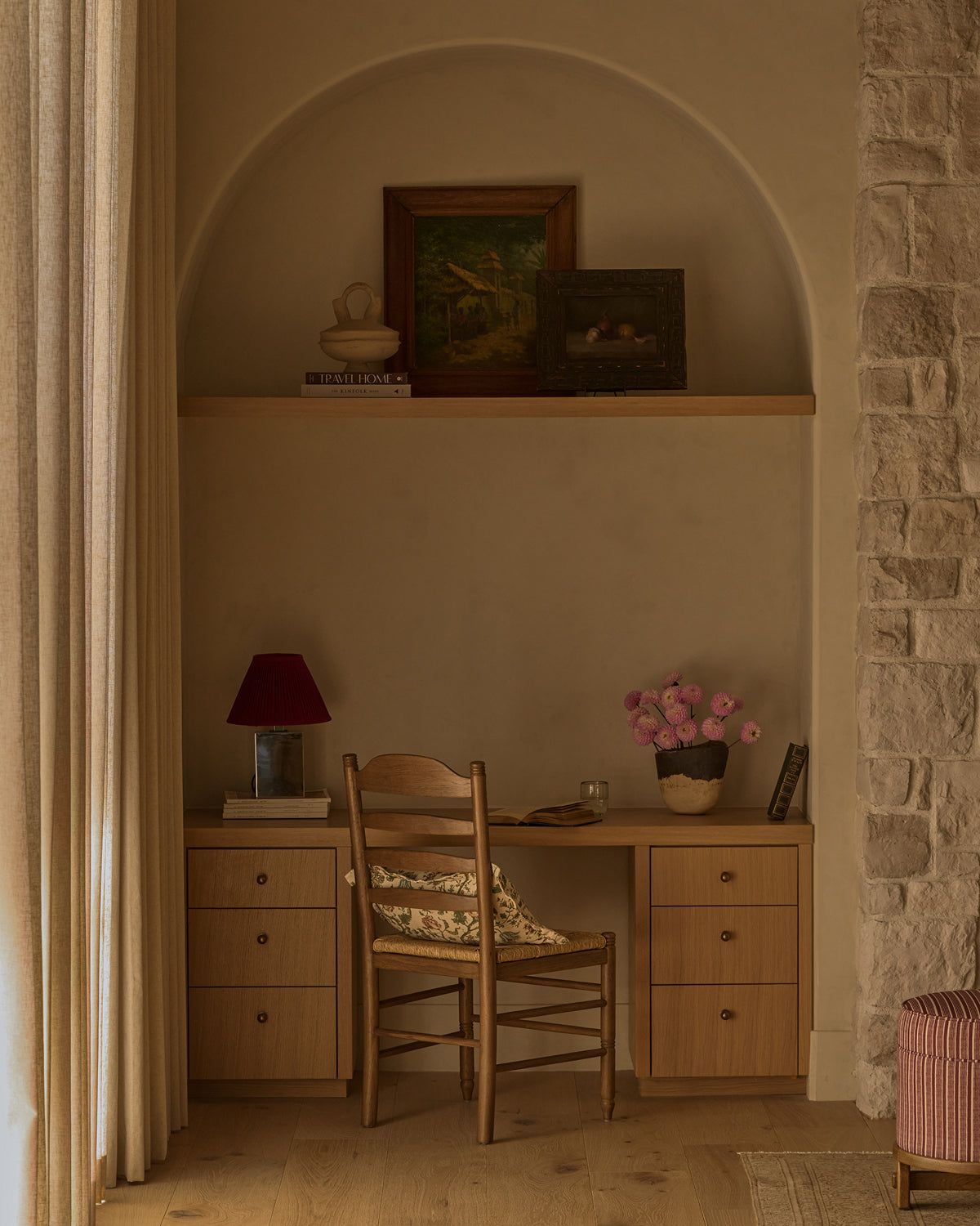 Nestled corner of a room with wooden desk, Lea brown oak dining chair, and shelves with decor.