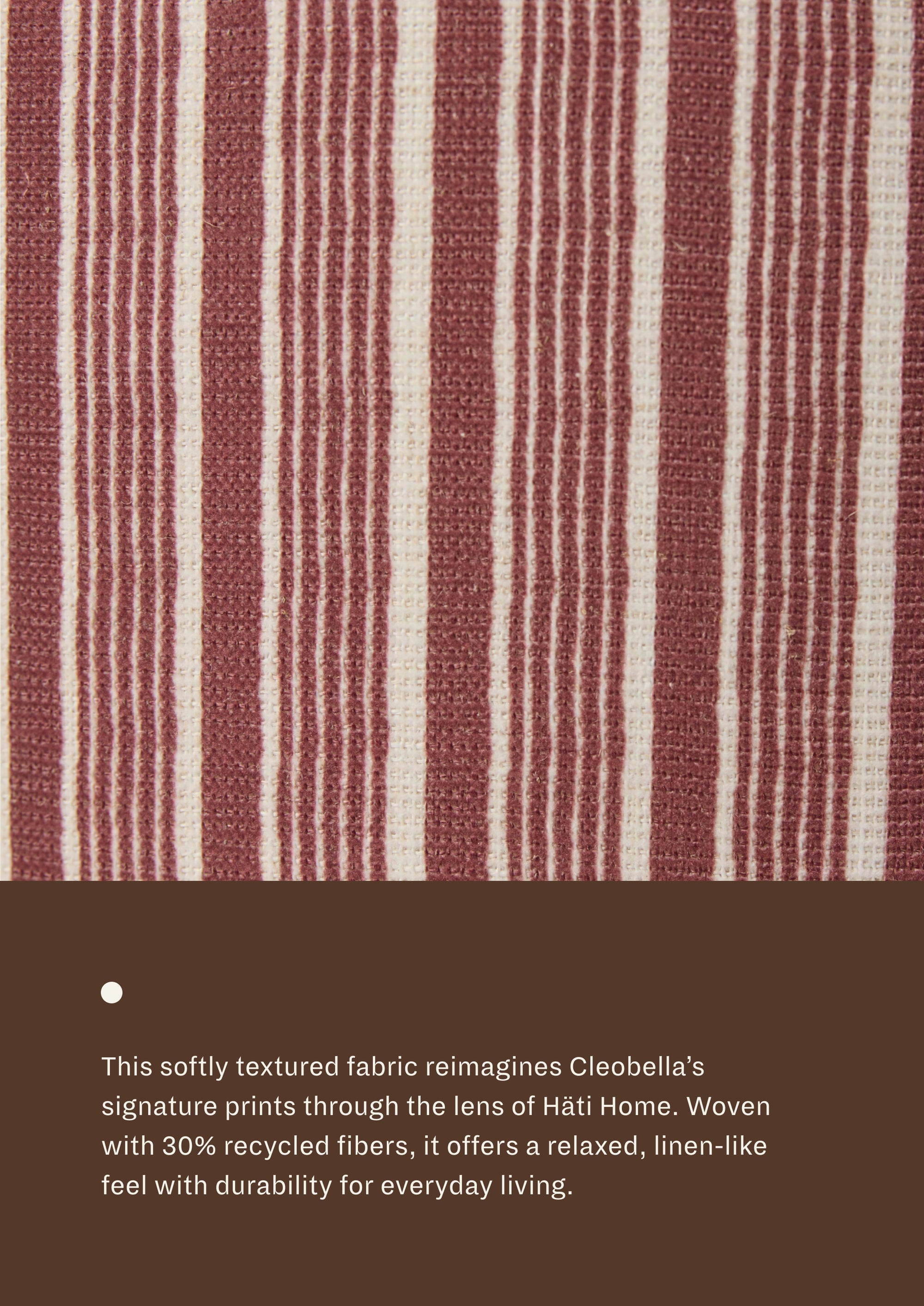 Close-up of the Oxblod Stripe fabric featuring alternating burgundy-red and ivory stripes. Woven with recycled fibers, the textile offers a relaxed, linen-like texture designed for everyday durability and comfort.
