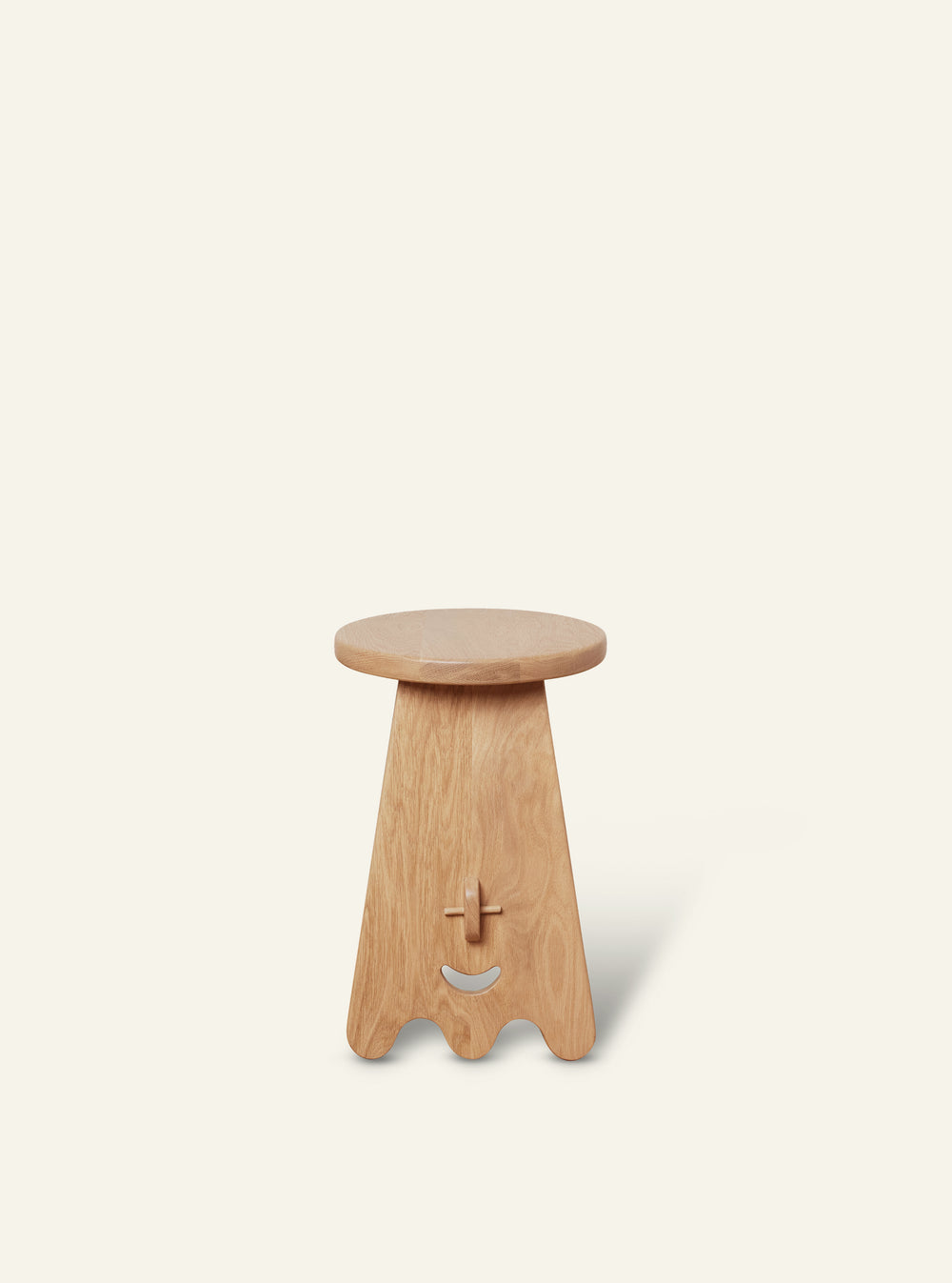 Side view of the Senja Side Table showcasing its clean construction, solid wood joinery, and sculptural silhouette.