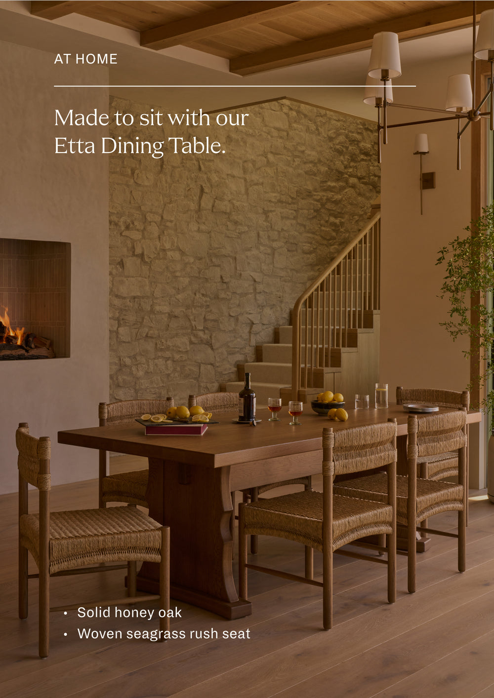 Made to sit with our Etta Dining Table. A collection of woven rush dining chairs gathered around a solid oak dining table in a warm, inviting interior. The natural textures and organic materials create a relaxed, timeless dining setting.
