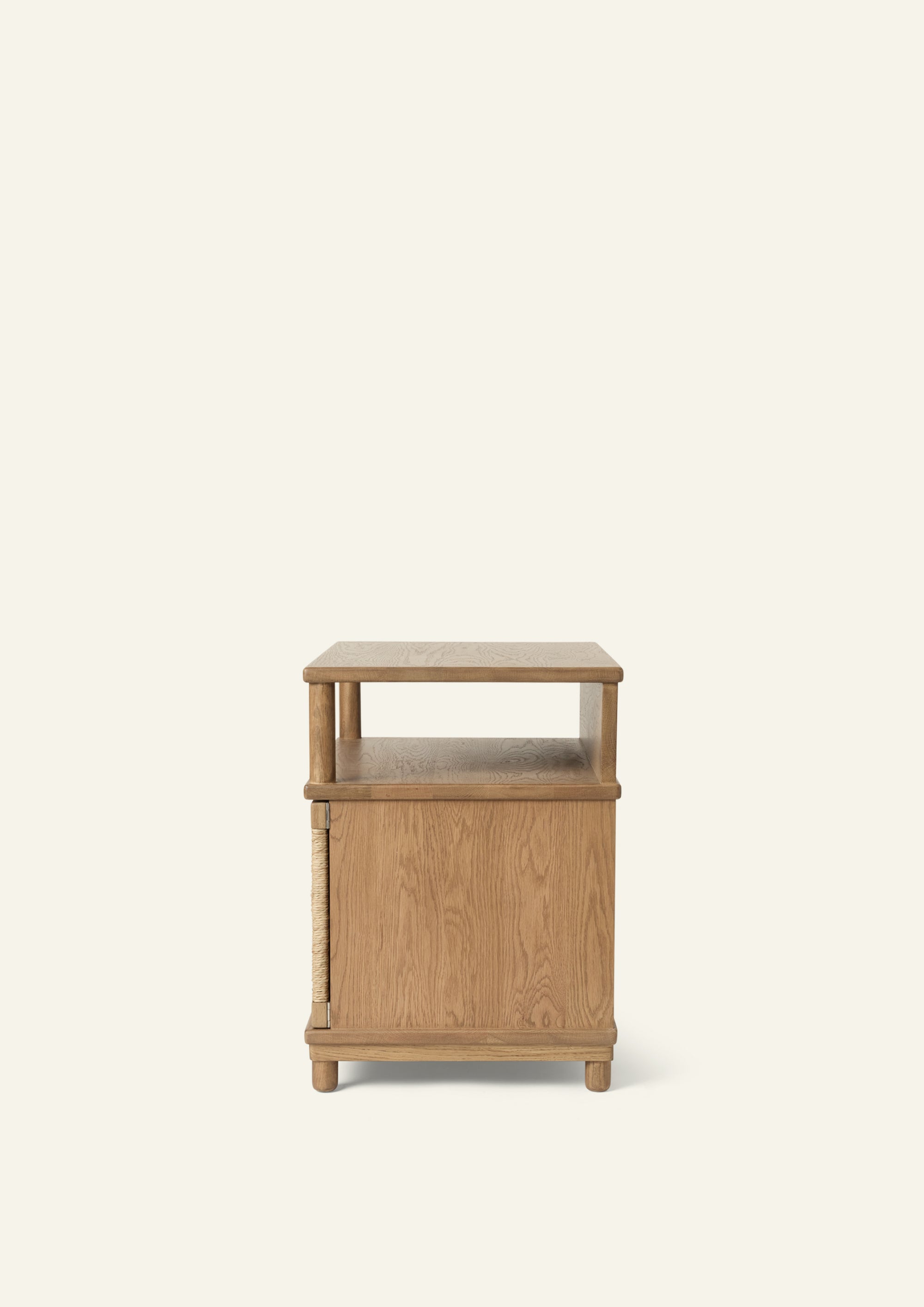 Side profile of the honey oak nightstand showing the open upper shelf, enclosed cabinet storage, and compact footprint. The design offers versatile storage while maintaining a clean, streamlined silhouette.