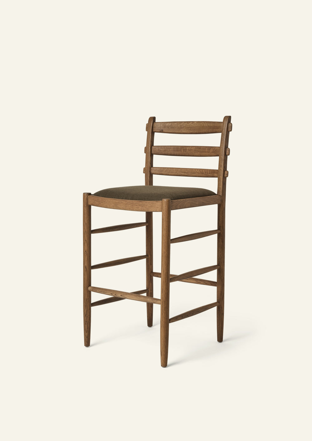 Tiga Counter Stool with a solid honey oak frame an upholstered performance olive linen seat, shown from an angled front view on a neutral background.