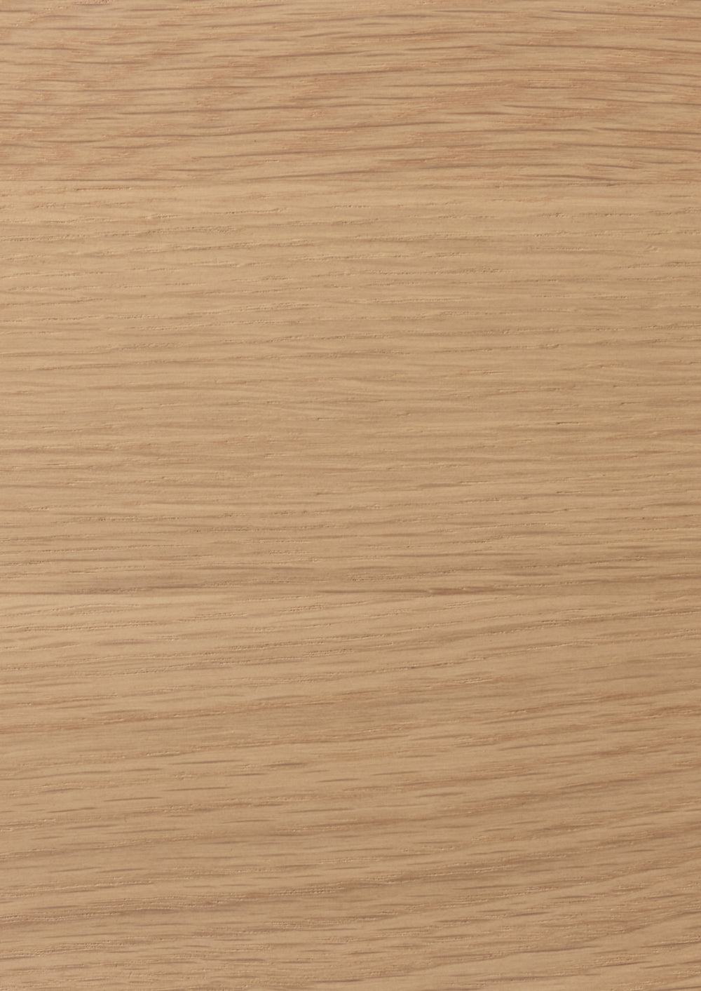 Close-up of a light oak surface with a light tan color and visible grain pattern.