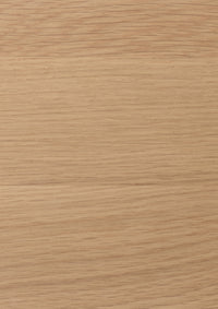 Close-up of a light oak surface with a light tan color and visible grain pattern.