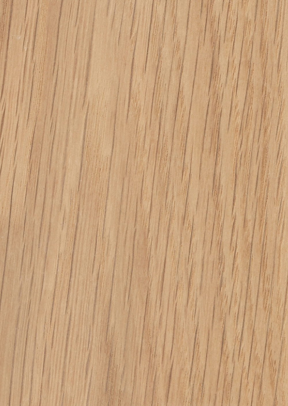 Close-up of a light oak surface with a light tan color and visible grain pattern.