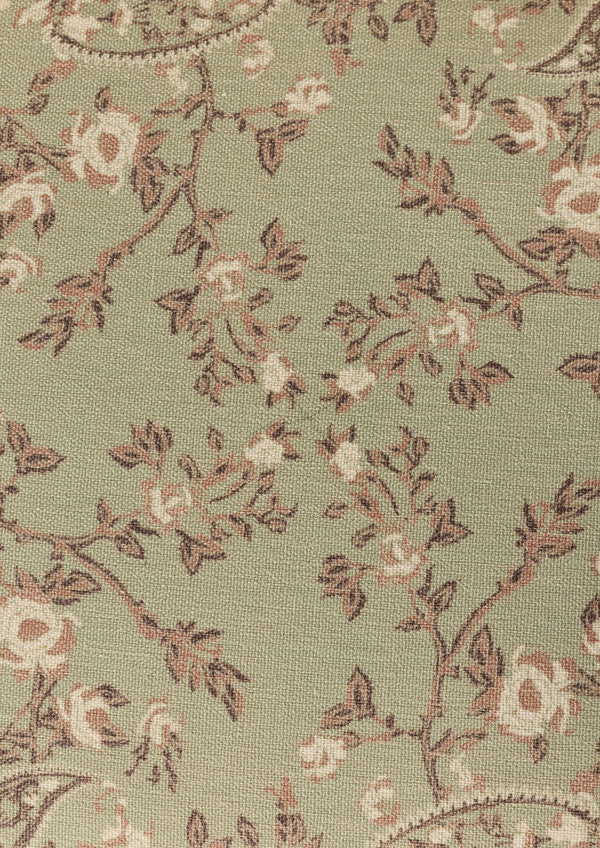 Ivory, tan and brown paisley fabric on a muted green base. 