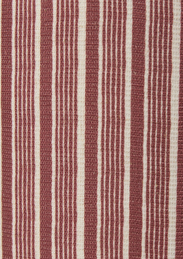 Oraganic brick red stripe pattern that alternates width of the stripes. 