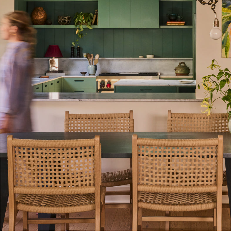 The Bali Dining Chair in a dining room setting.