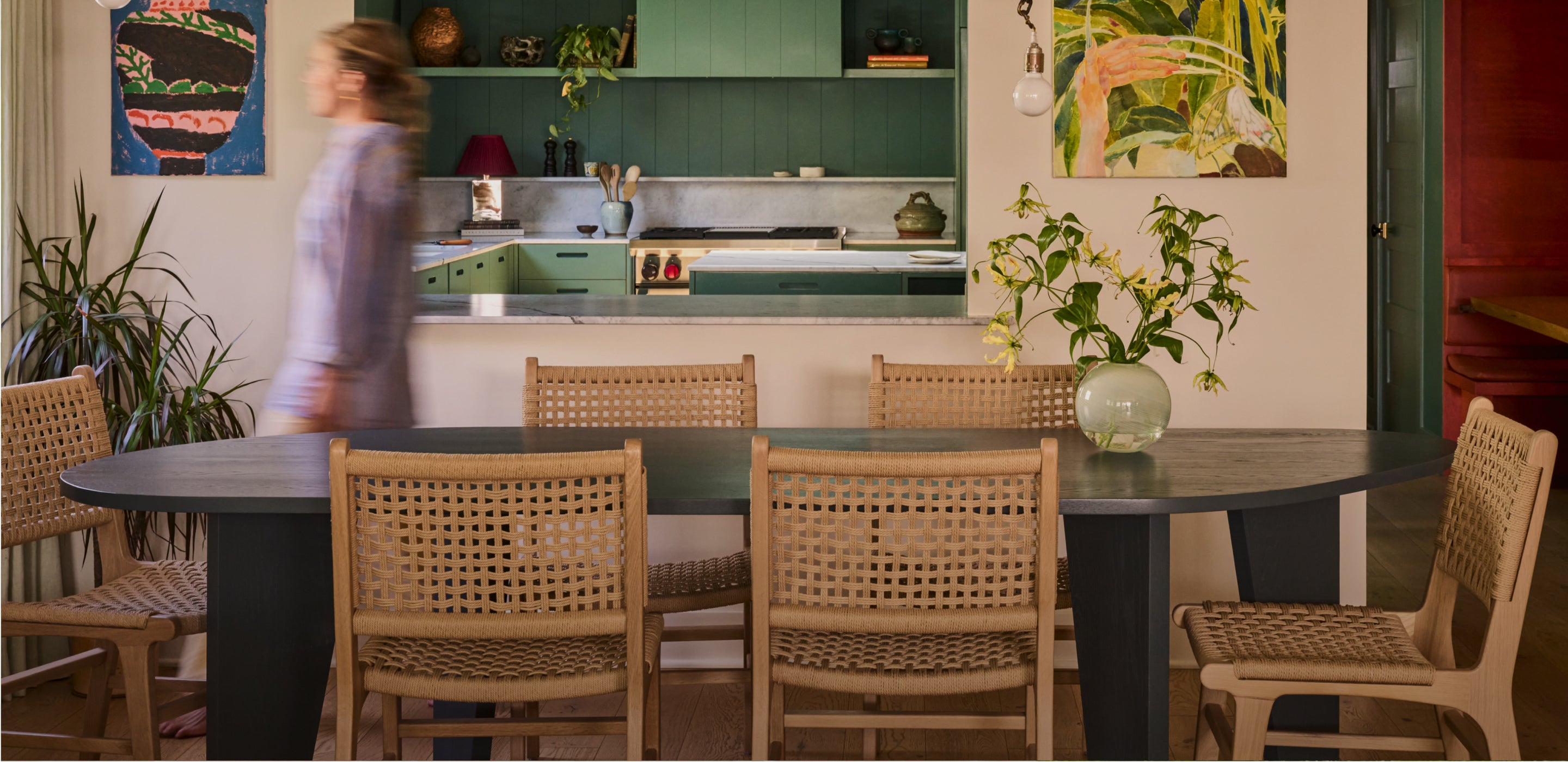 Six Bali Dining Chairs around a table in a dining room setting,