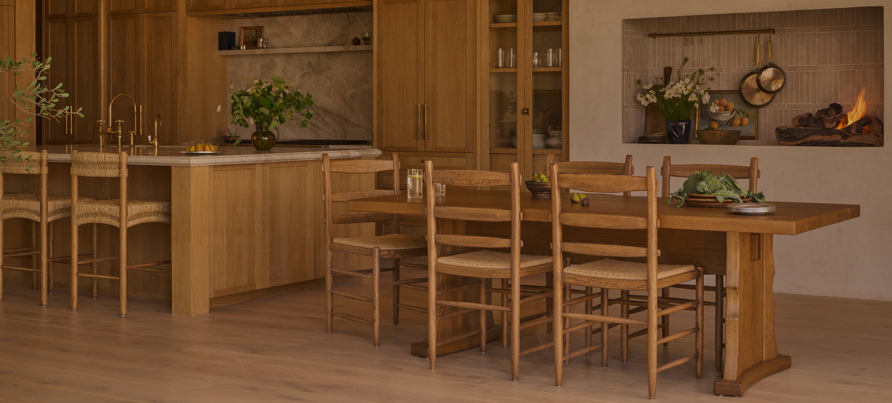 Wooden dining table with chairs in a kitchen setting