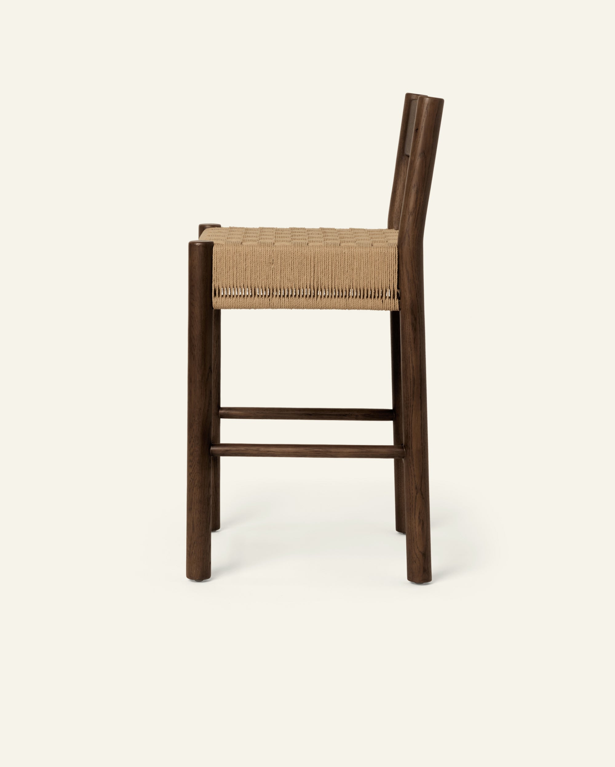 Isa Counter Stool - brown oak with a woven checkerboard paper cord